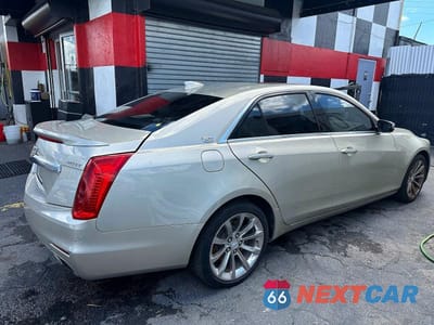 Czwarte zdjęcie samochodu z boku: 2016 CADILLAC CTS LUXURY COLLECTION VIN:1G6AX5SX9G0110193 - miniatura