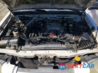 Zdjęcie 11 z 12 samochodu: 2004 NISSAN FRONTIER CREW CAB XE V6 VIN:1N6ED27T34C432086 - miniatura