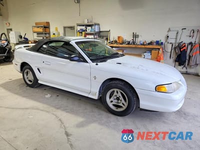 Czwarte zdjęcie samochodu z boku: 1996 FORD MUSTANG VIN:1FALP4443TF195578 - miniatura