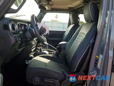 Zdjęcie 7 z 13 samochodu: 2023 JEEP WRANGLER SAHARA VIN:1C4HJXENXPW529816 - miniatura