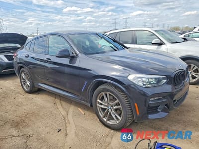 Czwarte zdjęcie samochodu z boku: 2021 BMW X4 XDRIVE30I VIN:5UX2V1C03M9H01467 - miniatura