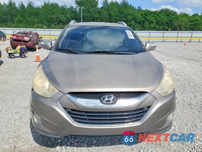 Piąte zdjęcie samochodu w środku: 2010 HYUNDAI TUCSON LIMITED VIN:KM8JU3AC8AU075232 - miniatura