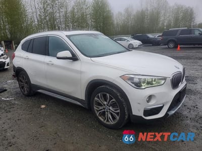 Czwarte zdjęcie samochodu z boku: 2019 BMW X1 XDRIVE28I VIN:WBXHT3C55K3H35485 - miniatura