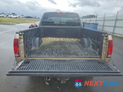 Zdjęcie 6 z 12 samochodu: 1999 FORD F150 VIN:1FTRX17L5XKB75254 - miniatura