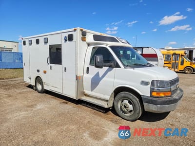 Czwarte zdjęcie samochodu z boku: 2015 CHEV EXPRESS G3500 VIN:1GB3G3CG0F1110556 - miniatura