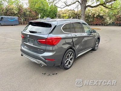 Czwarte zdjęcie samochodu z boku: 2019 BMW X1 XDRIVE28I VIN:WBXHT3C56K3H34345 - miniatura