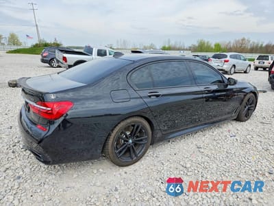 Trzecie zdjęcie samochodu z tyłu: 2016 BMW 750 XI VIN:WBA7F2C56GGE12389 - miniatura