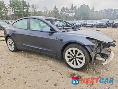 Czwarte zdjęcie samochodu z boku: 2021 TESLA MODEL 3 VIN:5YJ3E1EB7MF990229 - miniatura
