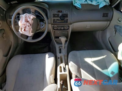 Zdjęcie 8 z 11 samochodu: 1999 TOYOTA COROLLA VE VIN:1NXBR12E5XZ183407 - miniatura