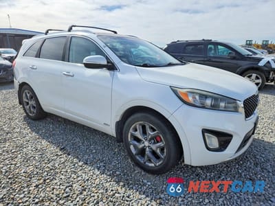 Czwarte zdjęcie samochodu z boku: 2016 KIA SORENTO SX V6 VIN:5XYPKDA56GG135840 - miniatura