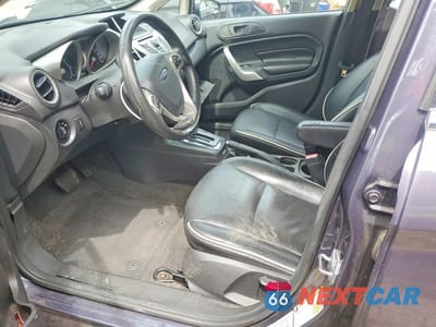 Zdjęcie 7 z 11 samochodu: 2013 FORD FIESTA TITANIUM VIN:3FADP4FJ3DM173380 - miniatura