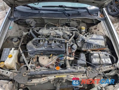 Zdjęcie 11 z 12 samochodu: 2002 NISSAN SENTRA XE VIN:3N1CB51D92L592996 - miniatura
