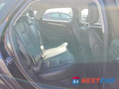 Zdjęcie 10 z 11 samochodu: 2013 FORD FUSION TITANIUM PHEV VIN:3FA6P0SU3DR332144 - miniatura