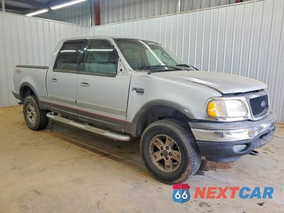 Czwarte zdjęcie samochodu z boku: 2003 FORD F150 SUPERCREW VIN:1FTRW08L13KB16031 - miniatura