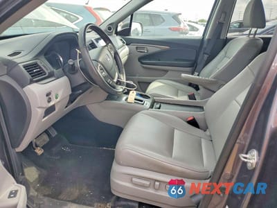 Zdjęcie 7 z 12 samochodu: 2018 HONDA PILOT EXLN VIN:5FNYF6H74JB005713 - miniatura