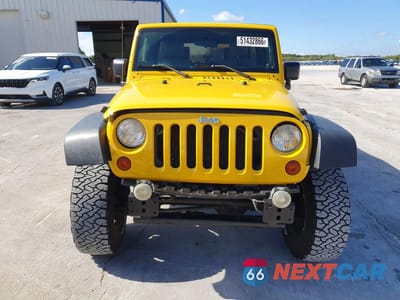 Piąte zdjęcie samochodu w środku: 2009 JEEP WRANGLER UNLIMITED X VIN:1J4GA39169L700197 - miniatura
