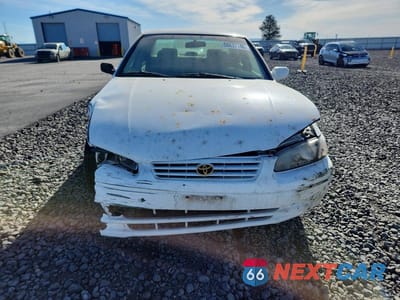 Piąte zdjęcie samochodu w środku: 1999 TOYOTA CAMRY LE VIN:4T1BG22K1XU907689 - miniatura