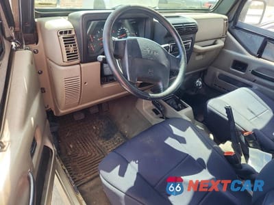 Zdjęcie 8 z 11 samochodu: 2003 JEEP WRANGLER / TJ SE VIN:1J4FA29123P356888 - miniatura