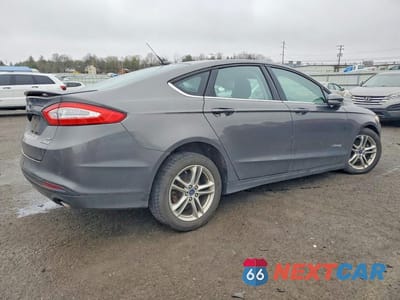 Trzecie zdjęcie samochodu z tyłu: 2016 FORD FUSION SE HYBRID VIN:3FA6P0LU4GR201260 - miniatura