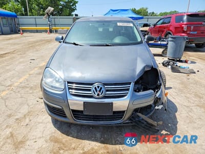 Piąte zdjęcie samochodu w środku: 2009 VOLKSWAGEN JETTA WOLFSBURG VIN:3VWRJ71K89M076733 - miniatura