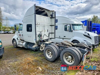 Trzecie zdjęcie samochodu z tyłu: 2012 INTERNATIONAL PROSTAR SEMI TRUCK VIN:3HSDJSJR2CN672765 - miniatura