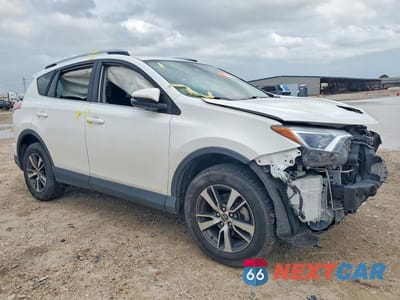 Czwarte zdjęcie samochodu z boku: 2018 TOYOTA RAV4 XLE VIN:JTMWFREVXJJ726154 - miniatura