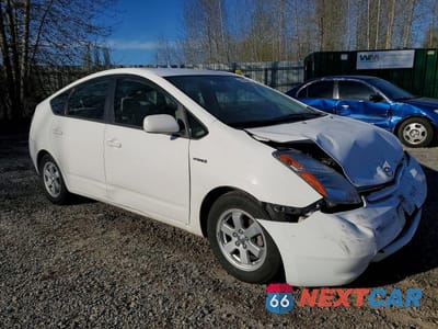 Czwarte zdjęcie samochodu z boku: 2006 TOYOTA PRIUS BASE VIN:JTDKB22U263143859 - miniatura