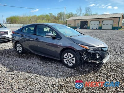 Czwarte zdjęcie samochodu z boku: 2017 TOYOTA PRIUS PRIME PREMIUM VIN:JTDKARFPXH3056715 - miniatura
