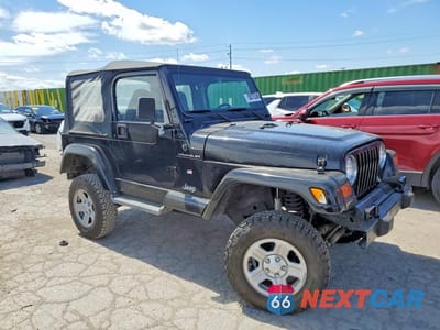 Czwarte zdjęcie samochodu z boku: 2000 JEEP WRANGLER / TJ SE VIN:1J4FA29P5YP702511 - miniatura