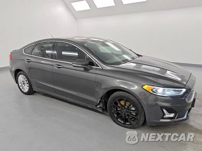 Czwarte zdjęcie samochodu z boku: 2019 FORD FUSION TITANIUM VIN:3FA6P0SU6KR231743 - miniatura