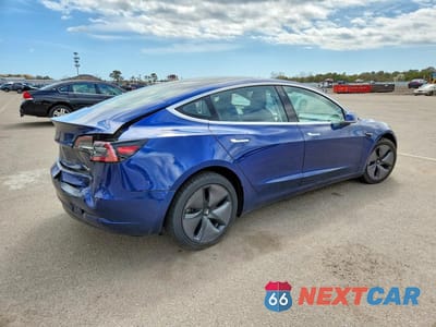 Trzecie zdjęcie samochodu z tyłu: 2018 TESLA MODEL 3 VIN:5YJ3E1EB6JF064447 - miniatura