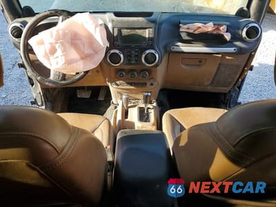 Zdjęcie 8 z 13 samochodu: 2013 JEEP WRANGLER UNLIMITED SAHARA VIN:1C4HJWEGXDL588521 - miniatura
