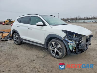 Czwarte zdjęcie samochodu z boku: 2017 HYUNDAI TUCSON LIMITED VIN:KM8J3CA21HU584454 - miniatura