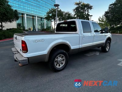 Czwarte zdjęcie samochodu z boku: 2005 FORD F250 SUPER DUTY VIN:1FTSW215X5EB64217 - miniatura