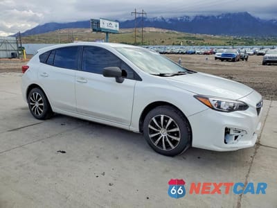 Czwarte zdjęcie samochodu z boku: 2017 SUBARU IMPREZA VIN:4S3GTAA61H3713272 - miniatura