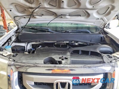 Zdjęcie 12 z 13 samochodu: 2011 HONDA PILOT EX VIN:5FNYF3H45BB006178 - miniatura