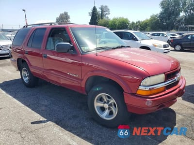 Czwarte zdjęcie samochodu z boku: 2002 CHEVROLET BLAZER VIN:1GNCS13W12K114066 - miniatura