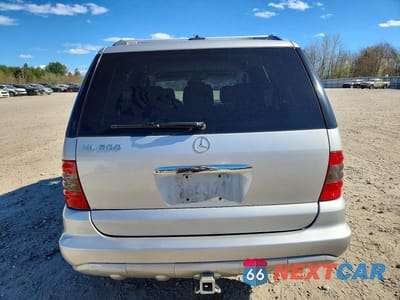 Zdjęcie 6 z 13 samochodu: 2005 MERCEDES-BENZ ML 500 VIN:4JGAB75E15A559596 - miniatura