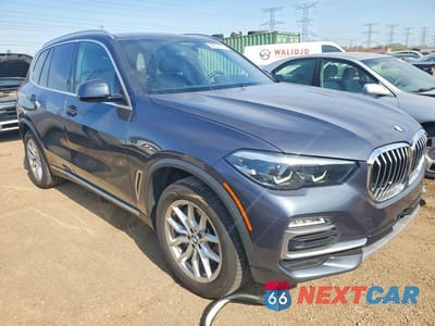 Czwarte zdjęcie samochodu z boku: 2021 BMW X5 XDRIVE45E VIN:5UXTA6C09M9H21803 - miniatura