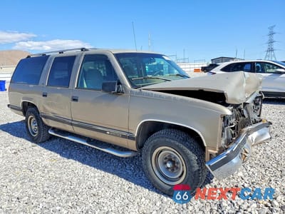 Czwarte zdjęcie samochodu z boku: 1995 CHEVROLET SUBURBAN C2500 VIN:3GNGC26K2SG102593 - miniatura