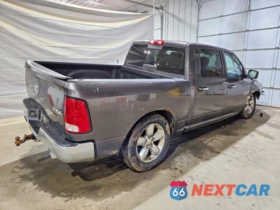 Trzecie zdjęcie samochodu z tyłu: 2015 RAM 1500 SLT VIN:3C6RR7LTXFG597200 - miniatura