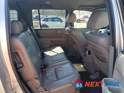 Zdjęcie 11 z 12 samochodu: 2010 HONDA PILOT EXL VIN:5FNYF4H54AB026578 - miniatura