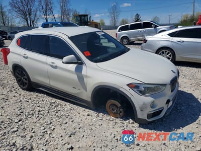 Czwarte zdjęcie samochodu z boku: 2018 BMW X1 XDRIVE28I VIN:WBXHT3C37J5F88104 - miniatura