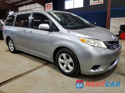 Czwarte zdjęcie samochodu z boku: 2011 TOYOTA SIENNA LE 8-PASSENGER VIN:5TDKK3DC2BS156713 - miniatura