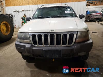 Piąte zdjęcie samochodu w środku: 2002 JEEP GRAND CHEROKEE LAREDO VIN:1J4GW48N02C278400 - miniatura