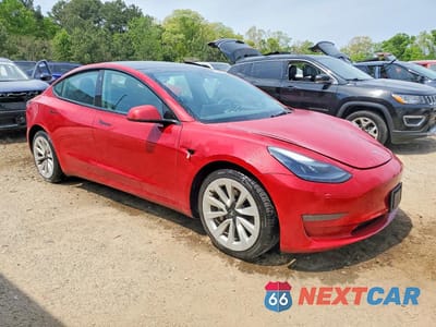 Czwarte zdjęcie samochodu z boku: 2023 TESLA MODEL 3 VIN:5YJ3E1EA3PF435788 - miniatura