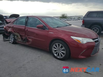 Czwarte zdjęcie samochodu z boku: 2016 TOYOTA CAMRY HYBRID XLE VIN:4T1BD1FK7GU189742 - miniatura