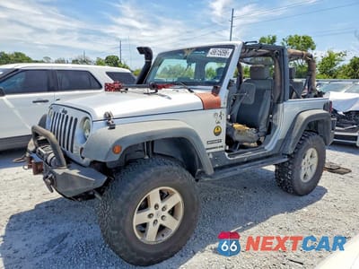 2010 JEEP WRANGLER SPORT 1J4AA2D19AL119997 - główne zdjęcie licytacji z USA - miniatura