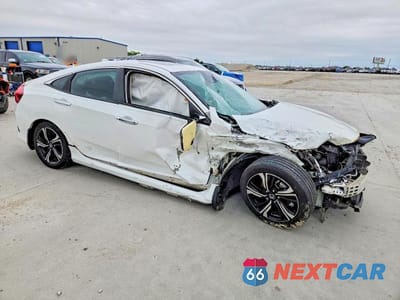 Czwarte zdjęcie samochodu z boku: 2017 HONDA CIVIC TOURING VIN:19XFC1F92HE020895 - miniatura