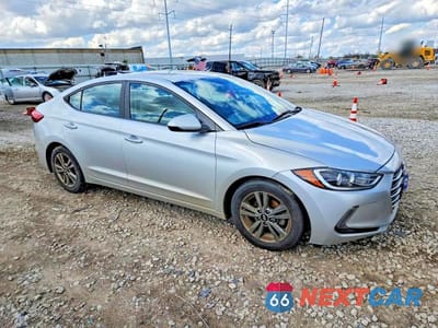 Czwarte zdjęcie samochodu z boku: 2018 HYUNDAI ELANTRA VALUE EDITION VIN:5NPD84LF5JH214018 - miniatura
